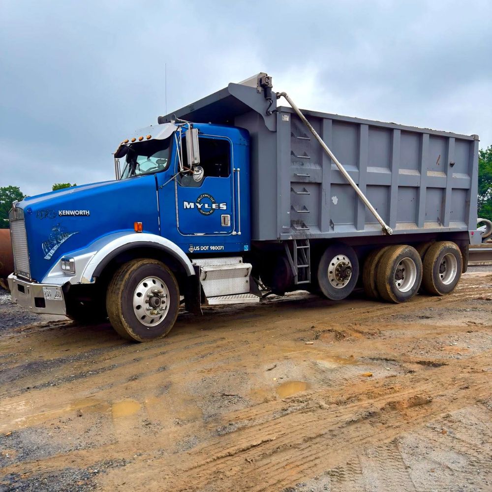 Dump Truck Parked at the Work Site Dump Truck Parked at the Work Site